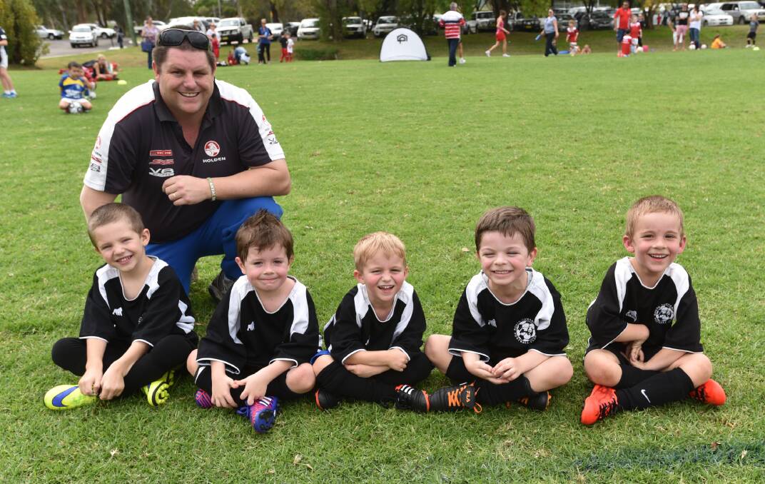 The North Companions White Under 6s  with coach Jamie Wise (from left) Connor Wise, Jamie McGregor, Ethan Lanesar, James Ryan and Jaxon Grills. Photo: Geoff O’Neill 020515GOB02
