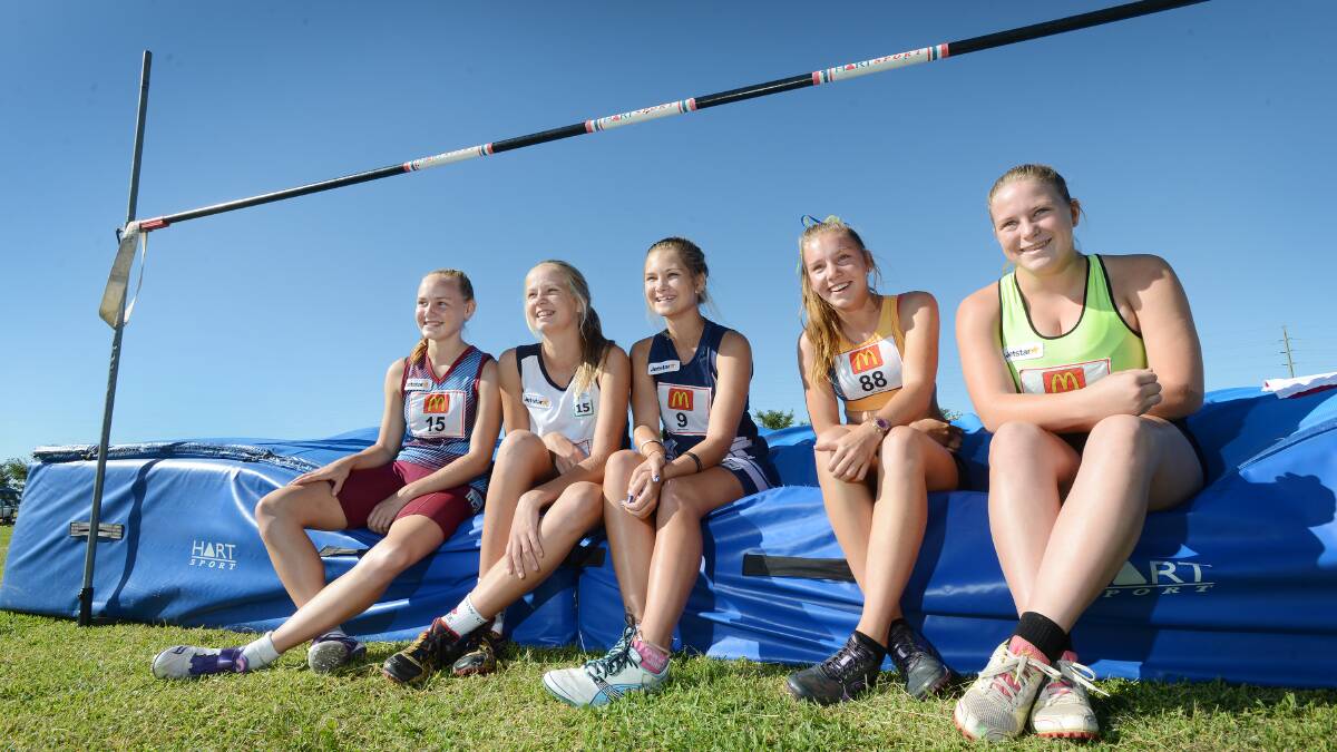 ATHLETES JUMP TO IT: Maddison Farrawell (left, Port Macquarie), Jaime Clissold (Moree), Jamie Blackler (Tamworth), Katie Byrnes (Lismore) and Renee Woods (Nambucca) all competed in the 15 years girls’ high jump at the two-day regional Little Athletics Carnival. Photo: Barry Smith 310115BSA01