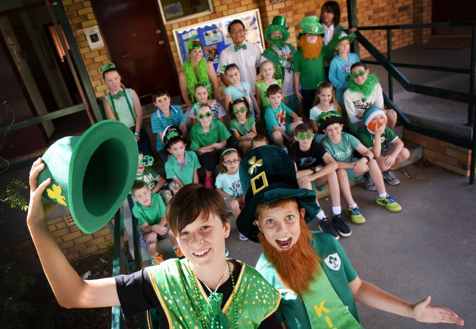 PADDY’S MATES: Ryan Southern (Year 6) and Cormac Rooney (Year 4) led the St Patrick’s Day 
celebrations at St Edward’s Primary School. Photo: Gareth Gardner 170315GGA02