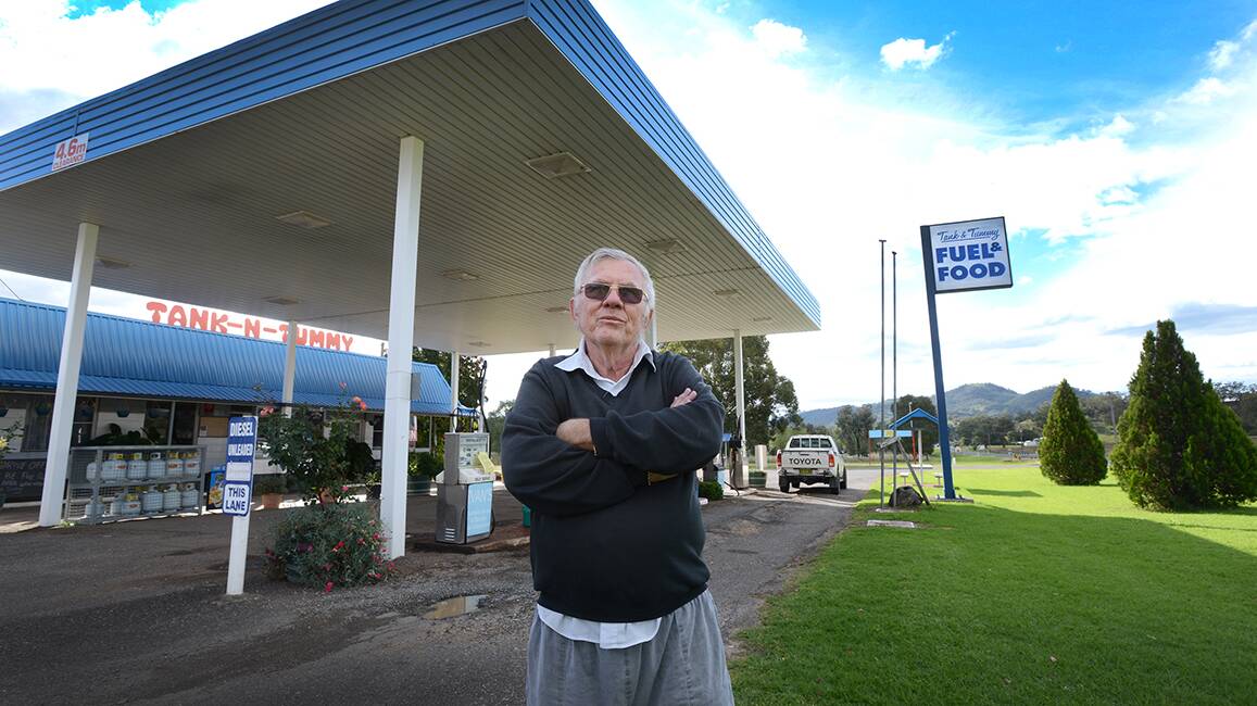 PAY BEFORE YOU FILL: 
Wallabadah Tank-N-Tummy Service Station owner Ivan 
Hulbert now wants payment before motorists fill up their tanks. 
Photo: Barry Smith 050514BSD08