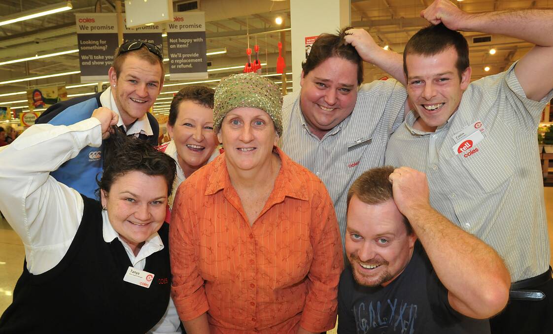 READY TO SHAVE: Tanya LeGarde, Leonie McConnachie, Ricky Wood in front, and Jack Webster, Vicci Zuiderduin, Corey Muxlow and Colin Lewis who are ready to lose their locks for cancer. Photo: Geoff O’Neill 200514GOB01