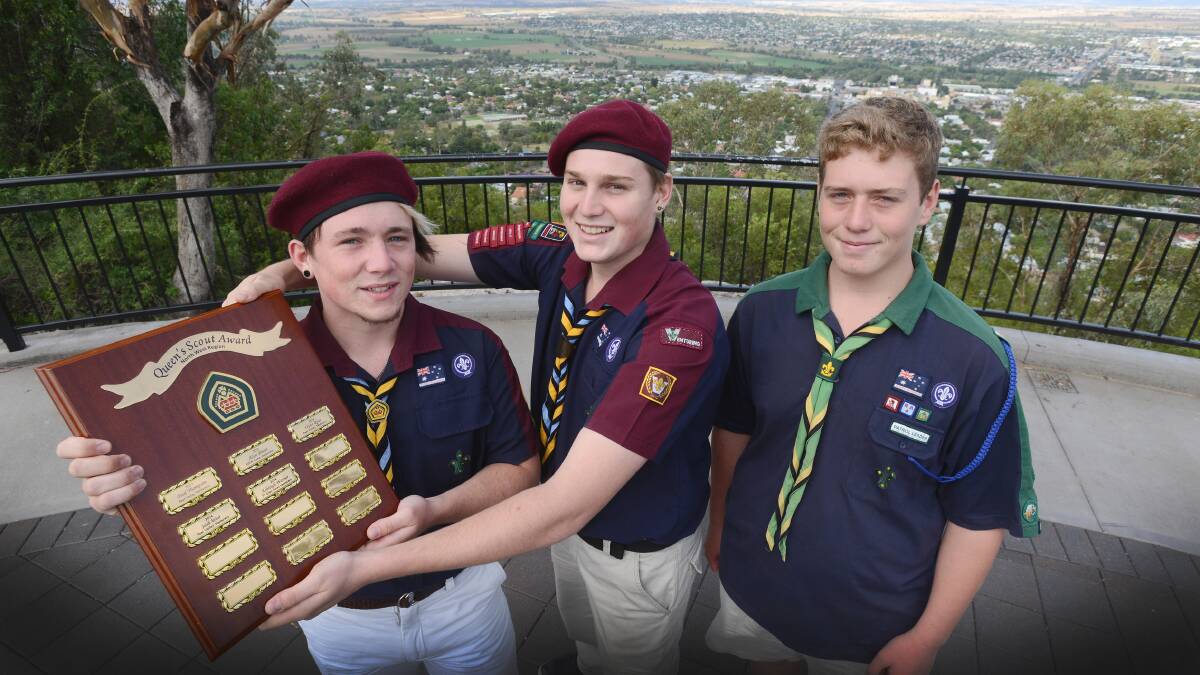 SCOUT HIGH-FLIERS: Flynn Ryan and Josh Weir with the Queen’s Scout Award and Daniel Grimmond with his Green Cord, preparing for the Australian Scout Medallion. Photo: Barry Smith 220214BSA01