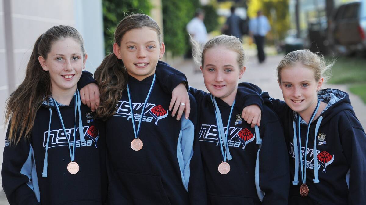 Dungowan’s bronze medal swimmers (from left) Alana Williams, Mia Newman, Claire O’Neill and Samantha O’Neill. Photo: Gareth Gardner 160414GGI02