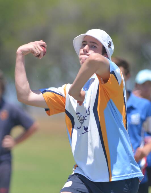 Inverell’s Richard Wilson lets rip with a legspinner at yesterday’s North West CHS Cricket Trials in Tamworth. He was later named in the NW side to play in the State CHS Carnival later in the season. Photo: Barry Smith 111114BSA15