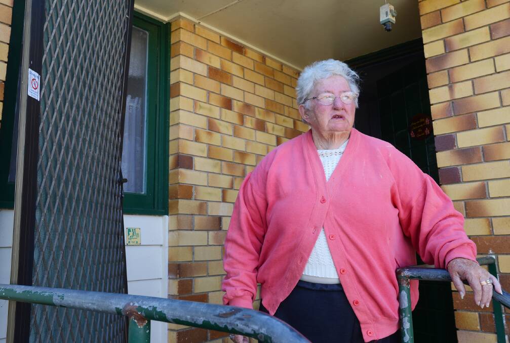 NIGHTTIME FRIGHT: Barbara Sims has had to repair her front screen door and security camera after a man looking for drugs broke into her West 
Tamworth home and confronted her. Photo: Barry Smith 050814BSB04