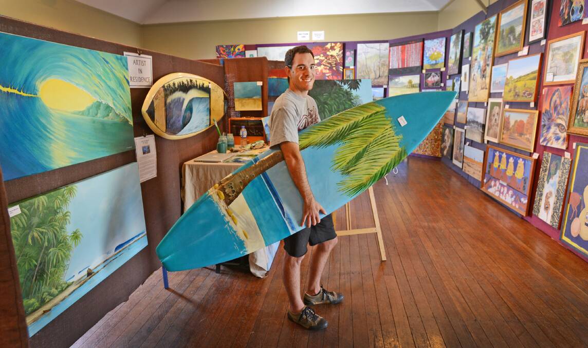 NEW WAVE ART: Surfer bloke Scott Denholm is one of the guest artists-in-residence for the colours of autumn Craft and Art Show. Photo: 140415BSA06