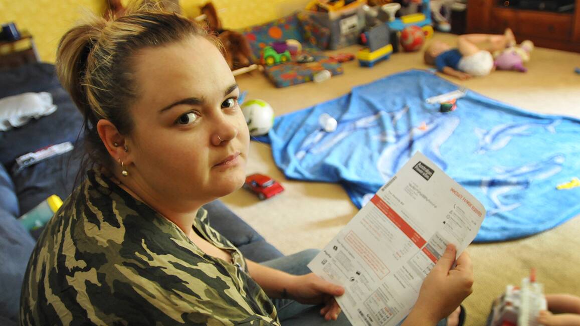 GIVE US A BREAK: Tamworth woman Taylah Shields, who juggles full-time work with raising five children, says soaring utility bills are crippling her family financially. Photo: Geoff O’Neill 190214GOC01