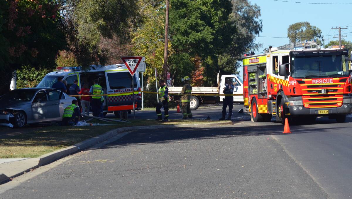 LUCKY ESCAPE: Three people were injured when two cars collided in Moree yesterday morning, including one woman who had to be cut free by local firefighters. Photo: The Moree Champion