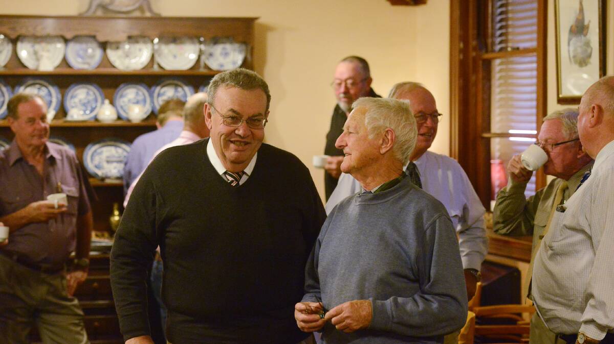 Showcasing HNWRA racing:  returning chairman Rod Watt (front left) and secretary Bob Scherf at yesterday’s annual general meeting at the Tamworth Hotel. Photo: Gareth Gardner  221014GGA01