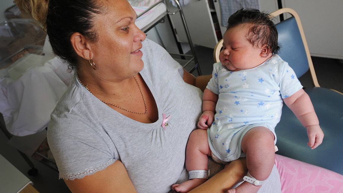 BABY BEHEMOTH: Moree mum Michelle Wharram shows off her new bub Bentley Dahlstrom, weighing in at nearly 6.3kg, the biggest baby ever born in Tamworth. Photo: Gareth Gardner. 100414GGG03