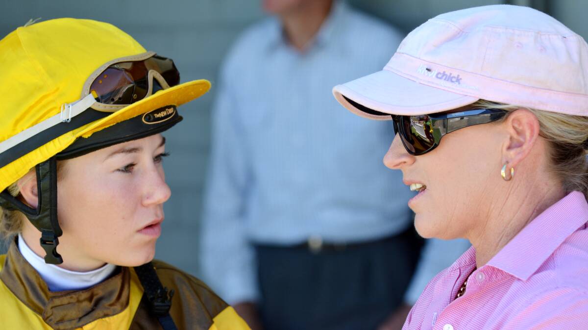 Sally Torrens and Sophie Young chat before their first win with Subtract on January 31.  Photo: Barry Smith  310114BSA04