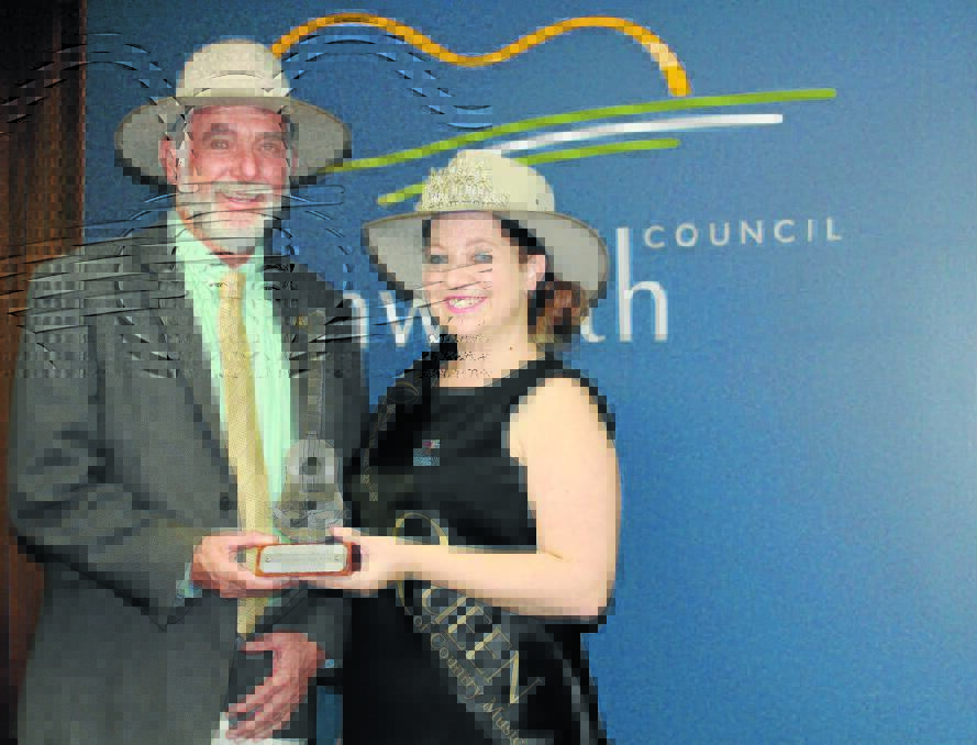 PACKED HER BAGS: Acting mayor Russell Webb with Queen Katrina Higgins and the Tamworth Country Music Capital Encouragement Award she will present to the Junior Overall Winner of the 2015 New Zealand Gold Guitar Awards.