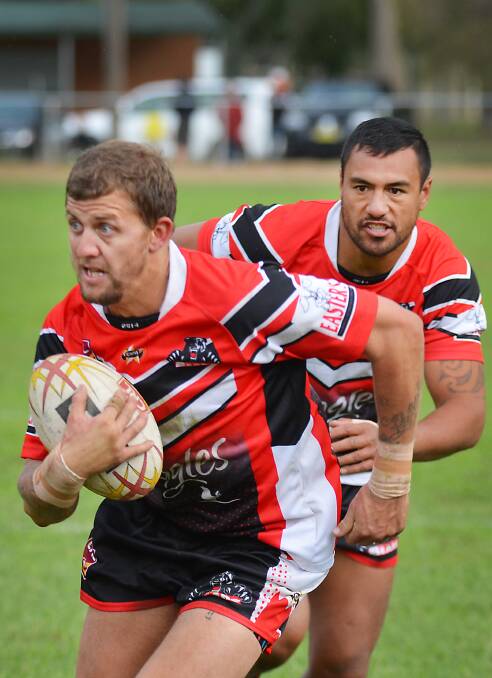Brock Wadwell picked up players’ player and man of the match for North Bears  as they scored 19 tries to beat Oxley Diggers on  Saturday. Ky Ruru is in support.  Photo: Chris Bath 030514BA01