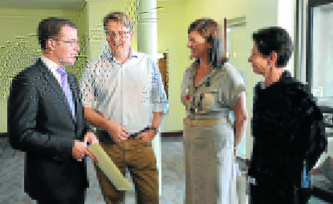 DETERMINED: Northern Tablelands MP Adam Marshall, left,  discusses the future of Armidale hospital yesterday with Dr David Rowe, Parliamentary 
Secretary for Regional Health Melinda Pavey and general manager Dona Withnell. 