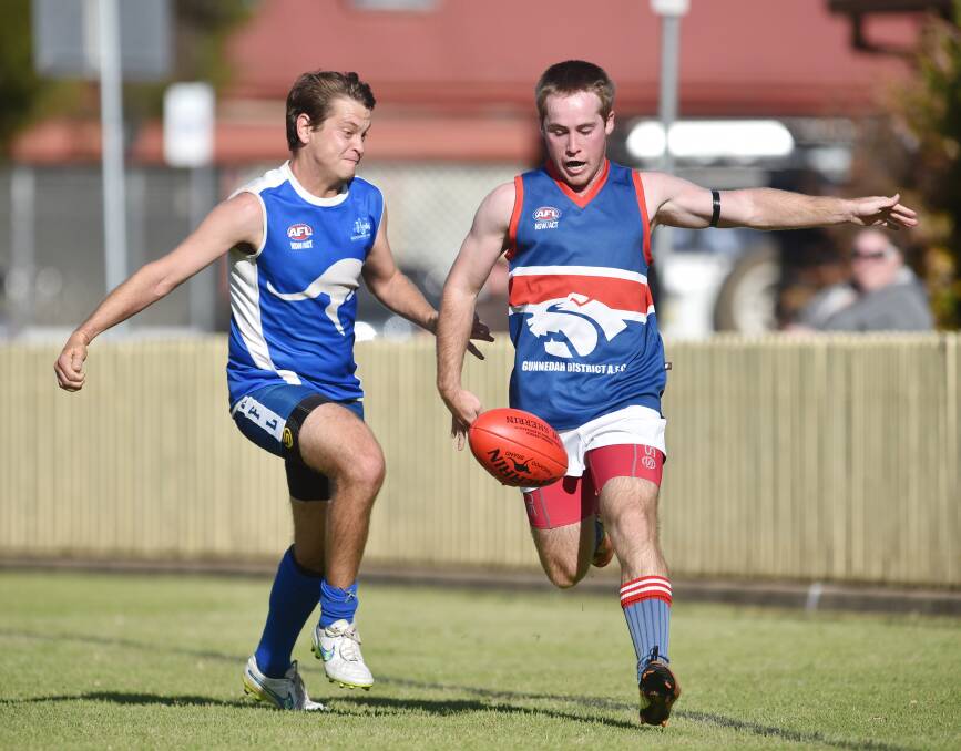Tamworth Kangaroo Liam Tone about to tackle Gunnedah’s Luke Curgenven in last
Saturday’s big win at No 1 Oval. Tomorrow the Roos host Moree while Gunnedah is at home to Inverell Saints.  Photo: Barry Smith 160515BSF16