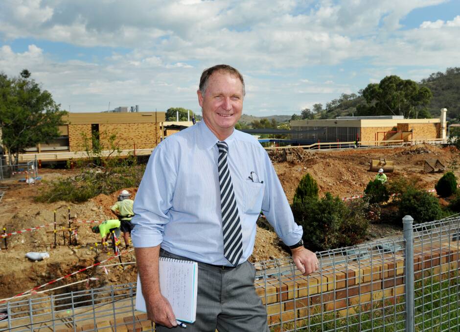 FOND FAREWELL: Oxley High School deputy principal Brian Haworth says he will be follow the Castlereagh block rebuild with great interest after he retired on Friday.  Photo: Geoff O’Neill 020414GOA02