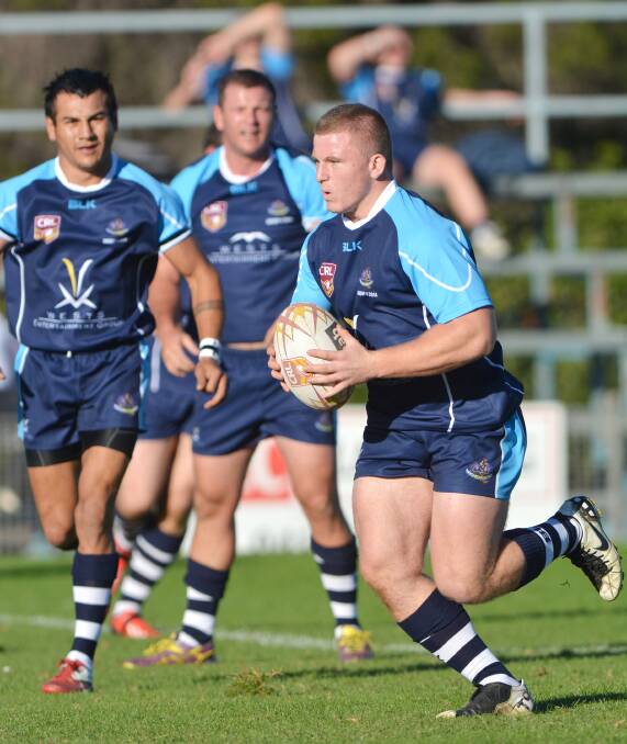 Young North Tamworth prop Jake Cocking takes the ball up for Group 4 during the recent Greater Northern Regional Championships. He’l be carting it up again for his Bears in tomorrow night’s big top of the table clash against Gunnedah at Kitchener Park, Gunnedah.  Photo: Barry Smith 170514BSH38