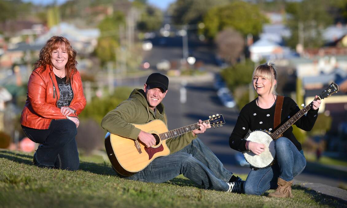 HATS OFF: Country music stars Marie Hodson, Aaron Bolton and Ashleigh Dallas are gearing up for the Hats Off to Country Festival this weekend. Photo: Barry Smith 010714BSE08