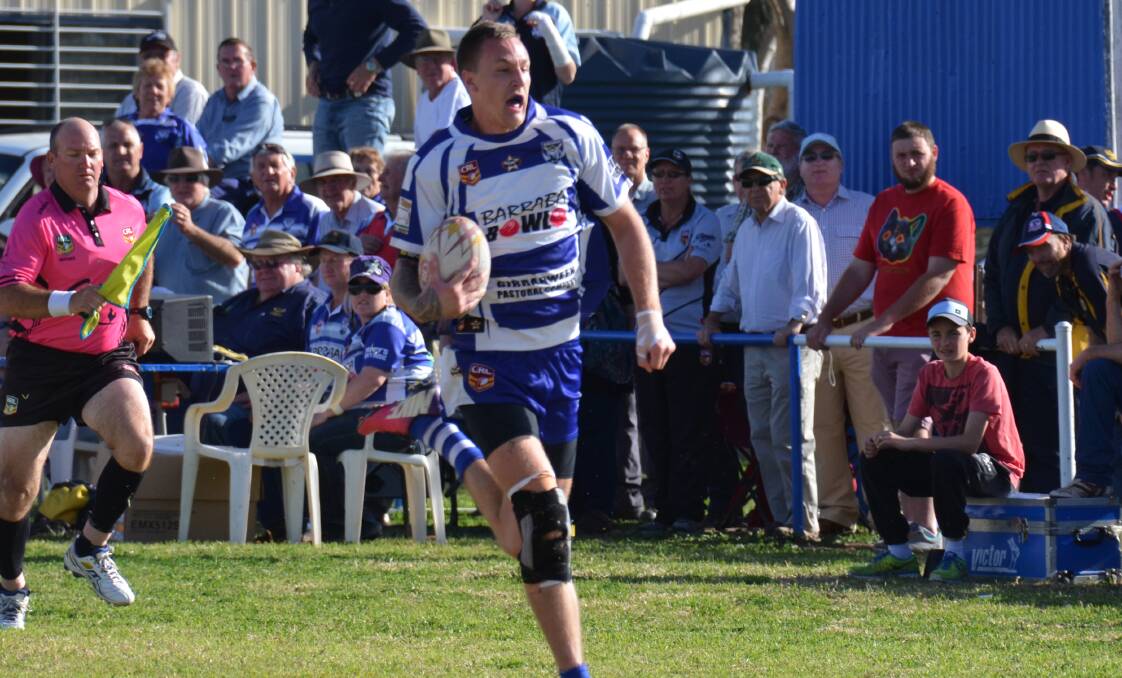 Kahlan Duncan runs away with a full field intercept try in front of his home Barraba crowd to go into the break up 18-10.  Photo: Chris Bath 140914CBB03