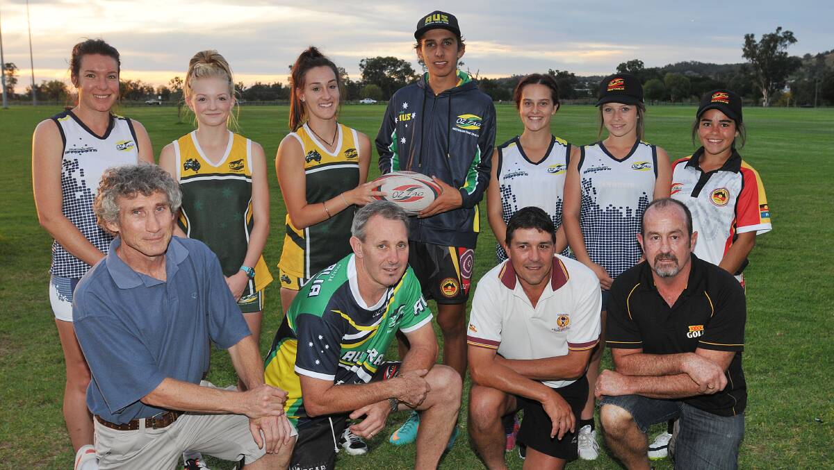 Having to cool their heels  for an  Australia versus  Barbarian day of Oztag are (back from left) Tiffany Walsh, Abby Schmiedel, Bronte Harris, Zarayn Knight, Megan Murphy, Steph Fulwood, Taylor Holcombe and  (front from left) Garth  Pennefather, Michael McKinnon, Scott Fitzgerald and Oscar Leonard.  Photo: Geoff O’Neill 090414GOG01