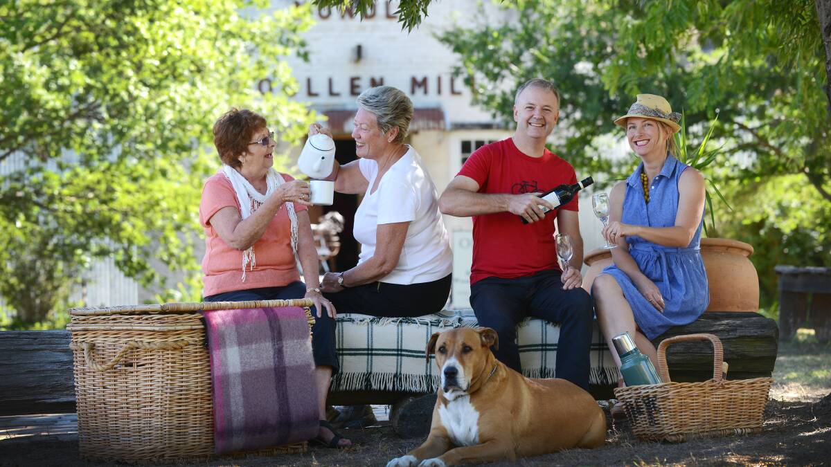 WINE AND DINE: From left, Claire Lennon, Margaret Schofield, Nick Bradford,
Megan Trousdale and Dutchy the dog are ready for the picnic. Photo: Barry Smith 120314BSB02