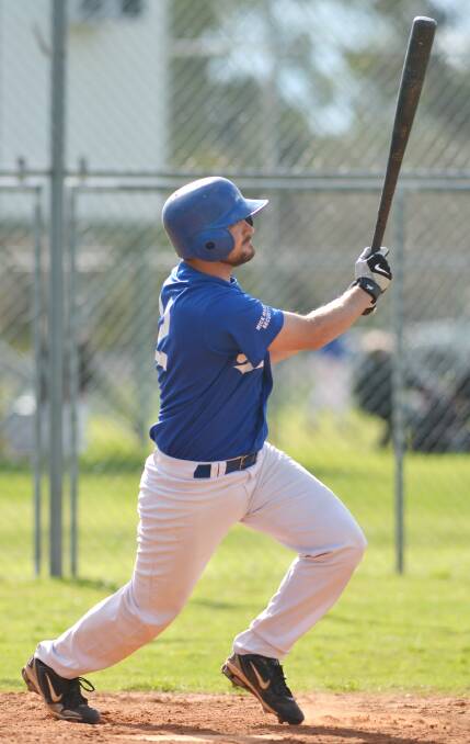 Warriors Blues catcher Chris Dyson hitting out.  Photo: Barry Smith  300814BSE16