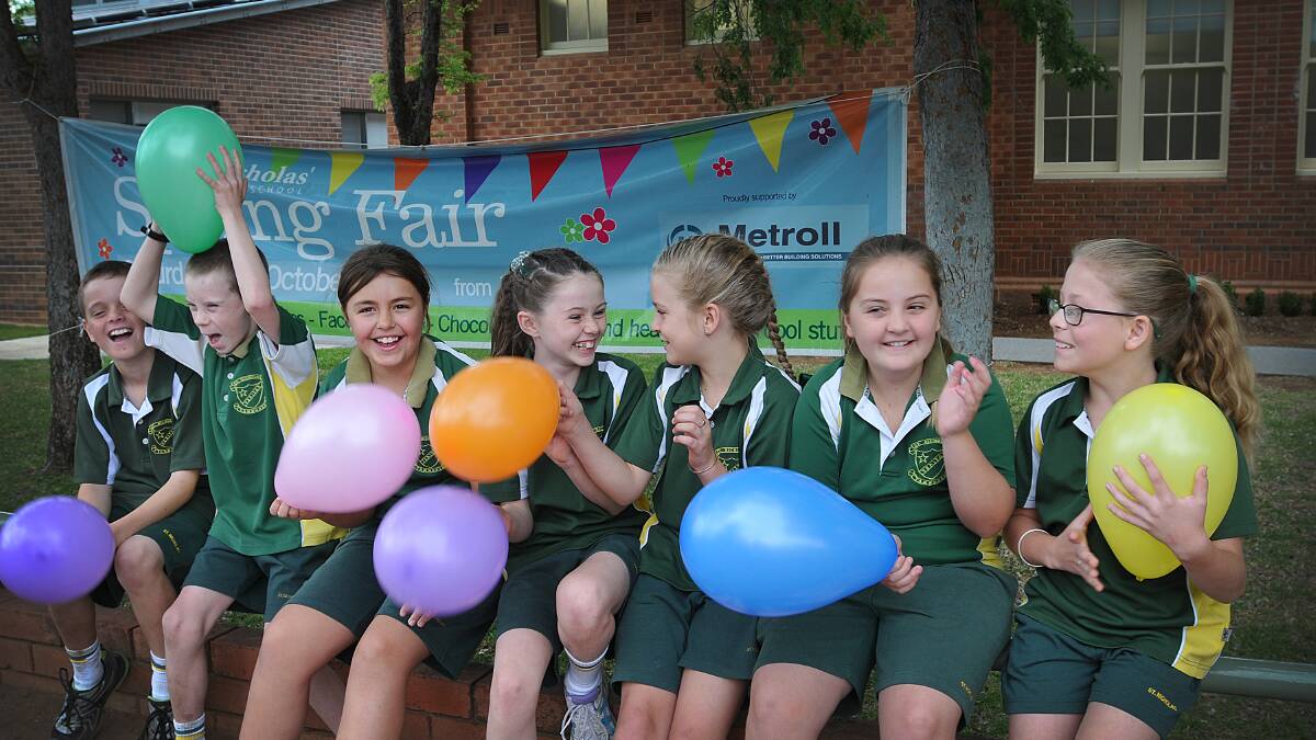 SOMETHING FOR EVERYONE: Preparing for today’s big fundraiser at St Nicholas Tamworth are, from left, Brady Painter, Will George, Abbi Dutton, Emma Byrne, Chloe Darlington, Mia Geddes and Josie Anderson, Photo: Geoff O’Neill 241014GOA01