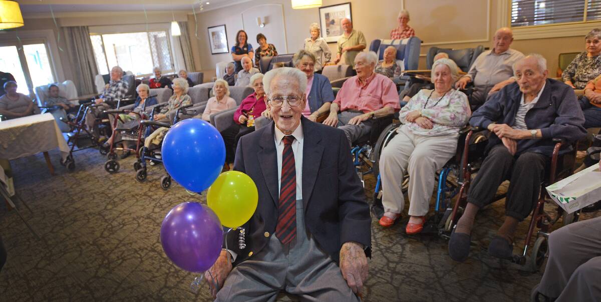 BIRTHDAY BOY: Alfred Powell is the centre of attention at Bupa yesterday in Tamworth for his106th birthday. Photo: Gareth Gardner 160914GGA01