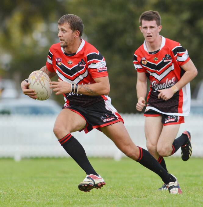 North Tamworth hooker Brock Wadwell received the three points in The NDL Group 4 
Player of the Year Award. Young winger Callum Hayne, who scored three tries in Saturday’s 68-10 win, backs up. Photo: Barry Smith 260414BSF21