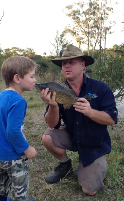 FRIENDLY: Aquaponics expert Ian Campbell, pictured here with his son Kye, will be in Tamworth this weekend presenting a beginners’ course in backyard aquaponics. 