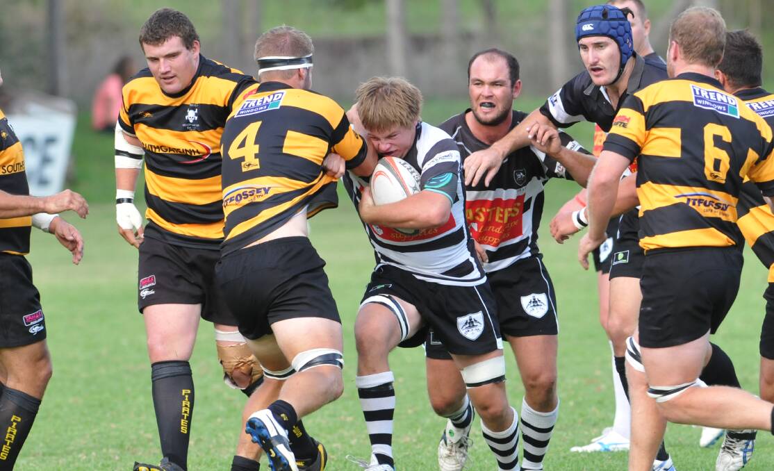 Ben Goodman watches Tamworth’s Harry Veitch try to power through Pirates second-rower Blake Pollock with Jack Barker and Al Doyle in support as Pirates flanker Andrew Wynne looks to come in.  Tamworth is yet to register a win this season. Photo: Geoff O’Neill 120414GOD01