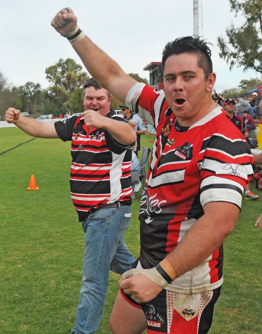 Bears prop Bill Jeffery (front) and coach Brad McManus celebrate the final hooter and a 58-16 Group 4 first grade grand final win over Gunnedah. Tomorrow night they will be celebrating the unbeaten season as well as a Clayton Cup at Tamworth Golf Club. Photo: Gareth Gardner 210914GGD19