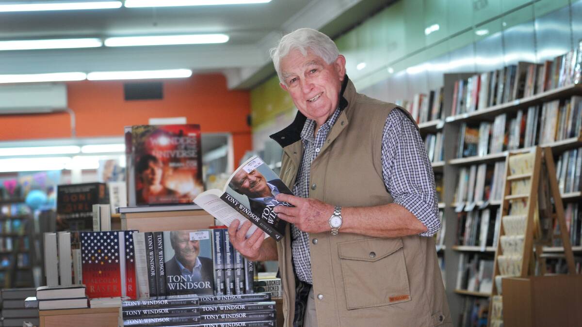 BOOK BLOKE: Tamworth resident and long-time campaign supporter Peter Wakeford was one of the first to buy the new book when it hit shelves yesterday. Photo: Gareth Gardner 150714GGA02
