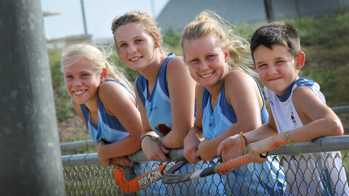 Tamworth’s (from left)  Lori Edgar, Tayla King, Billie Mitchell and Lachlan Butler are all smiles as they prepare to play for their state at the indoor nationals. 
Photo: Gareth Gardner 190115GGJ02