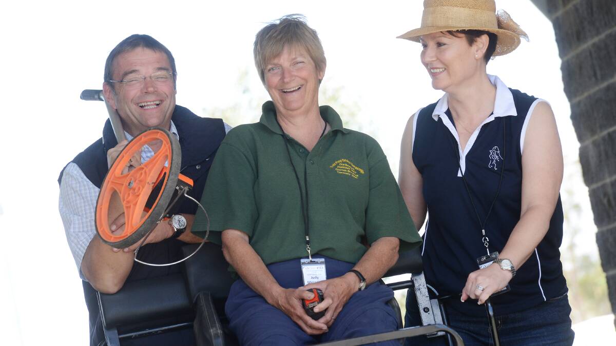 Carriage driving is on show at Tamworth this weekend with (from left) course designer  Dr. Wolfgang Asendorf, Jody Meredith and  Lyn Cunnew.   Photo: Gareth Gardner  091014GGD01