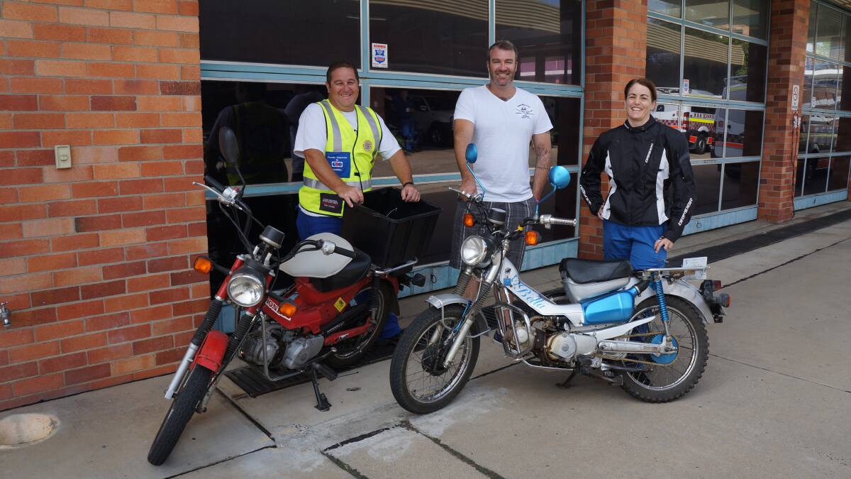 ON THE ROAD: From left, Post2Coast organisers Clint McSpedden and Stuart Griffin with rider Jill Putzolu. Photo: The Inverell TImes