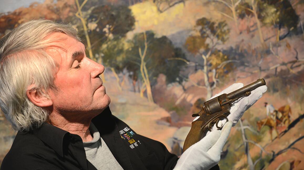 HISTORIC: McCrossin’s Mill director Kent Mayo with the gun that 
Constable Alexander Binney Walker used to shoot down Captain 
Thunderbolt on May 25, 1870. Photo: Barry Smith 030414BSB05