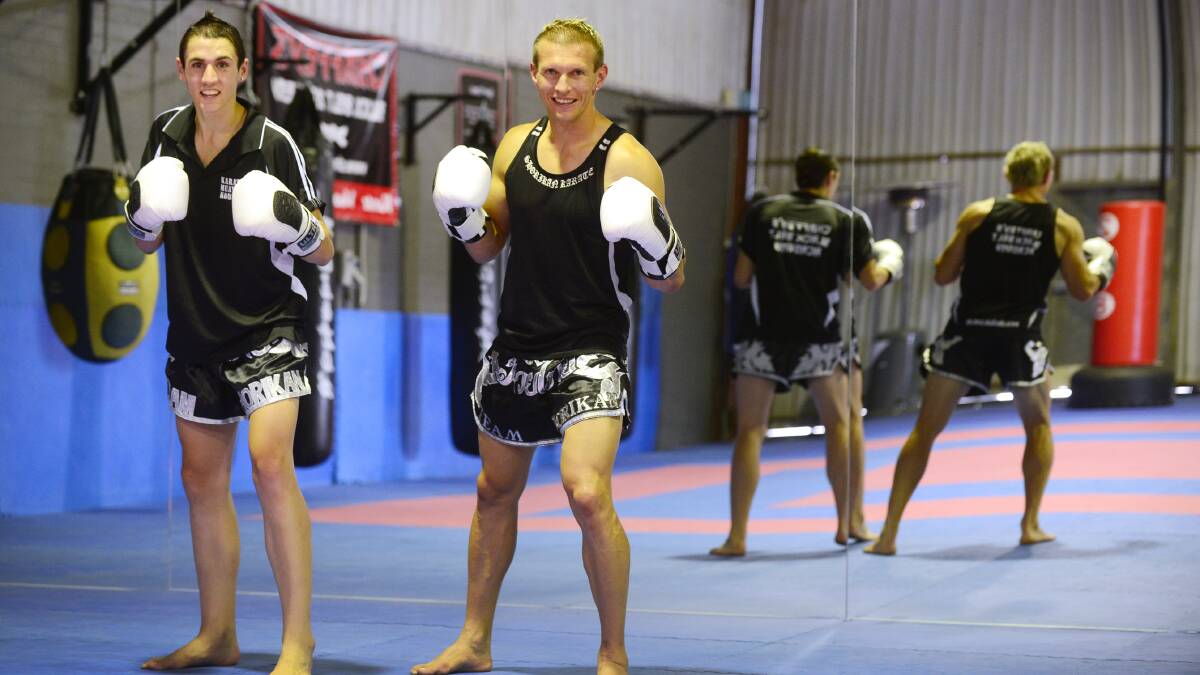 Brayden Johnston (left) and Scott Chaffey have been kicking out into muay thai kickboxing. Photo: Barry Smith 100214BSC04