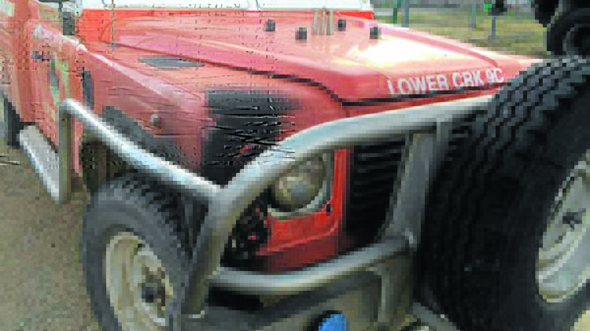 MINOR DAMAGE: The RFS truck escaped virtually unscathed after helping to rescue a local farmer near Armidale. Photo: RFS