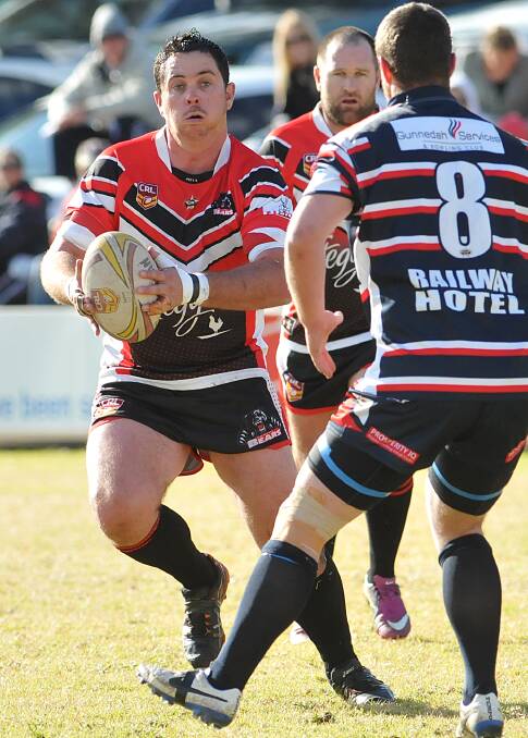 North prop Bill Jeffery about to crash into the Gunnedah defence led by Jason Smith in last 
Saturday’s big win by North. Today the Bears tackle West Lions at Jack Woolaston Oval. Photo: Geoff O’Neill 120714GOG03