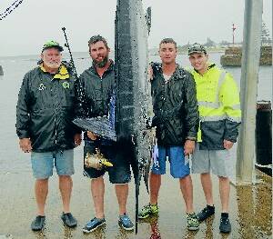 PETERS PRIZE: Dad Michael Peters with sons Shane and Wesley and grandson River Peters with their grand catch last Wednesday.