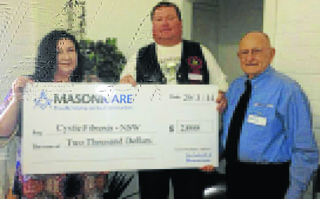 MOTORCYCLISTS CARE: Keryn Schawger (regional services Cystic Fibrosis NSW), Cameron Staines (president Masonic Motorcycle Association of Australia) and Dave Robertson (regional manager Mason I Care) with the cheque the motorcycling organisation presented to Cystic Fibrosis NSW in Tamworth recently.