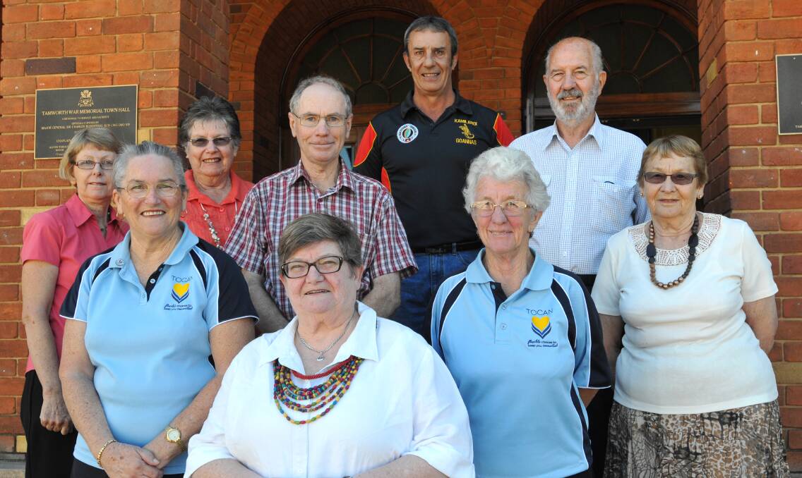 HONOURED: Some of Tamworth’s most generous volunteers congratulated Wendy Smith (pictured front) at yesterday’s Seniors Week award ceremony at Tamworth Town Hall. Back from left: Jean Holder, Janet Carrol, Gwen O’Neill, Bill Holder, Brad Sutherland, Elizabeth Winner, and Stan and Margaret Bryant. Photo: Geoff O’Neill 170314GOF01