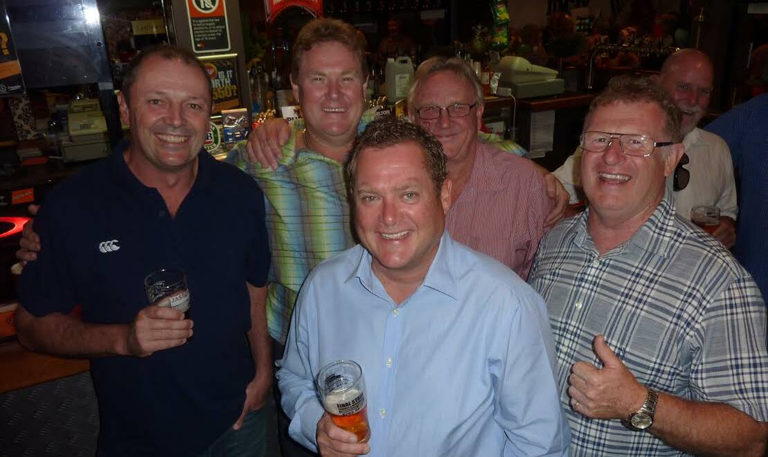 CHEERS: Publicans and former publicans – from left – Noel Corney (ex-Tudor), Gary Burgess (Central), Roger Rumble (Tamworth Hotel), Des Gilfillian (Oasis Hotel-Motel) and Greg Stannard (ex-Locomotive Hotel). Photo: Anna Rose