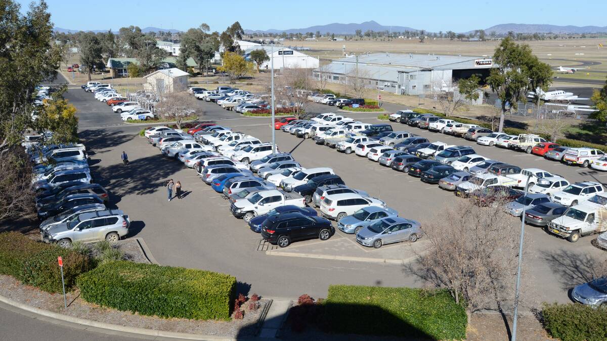 CHRONIC CONGESTION: Tamworth airport is set for a revamp – and possibly the introduction of paid parking – to ease bottlenecks in the car park. 
Photo: Barry Smith 140814BSA06