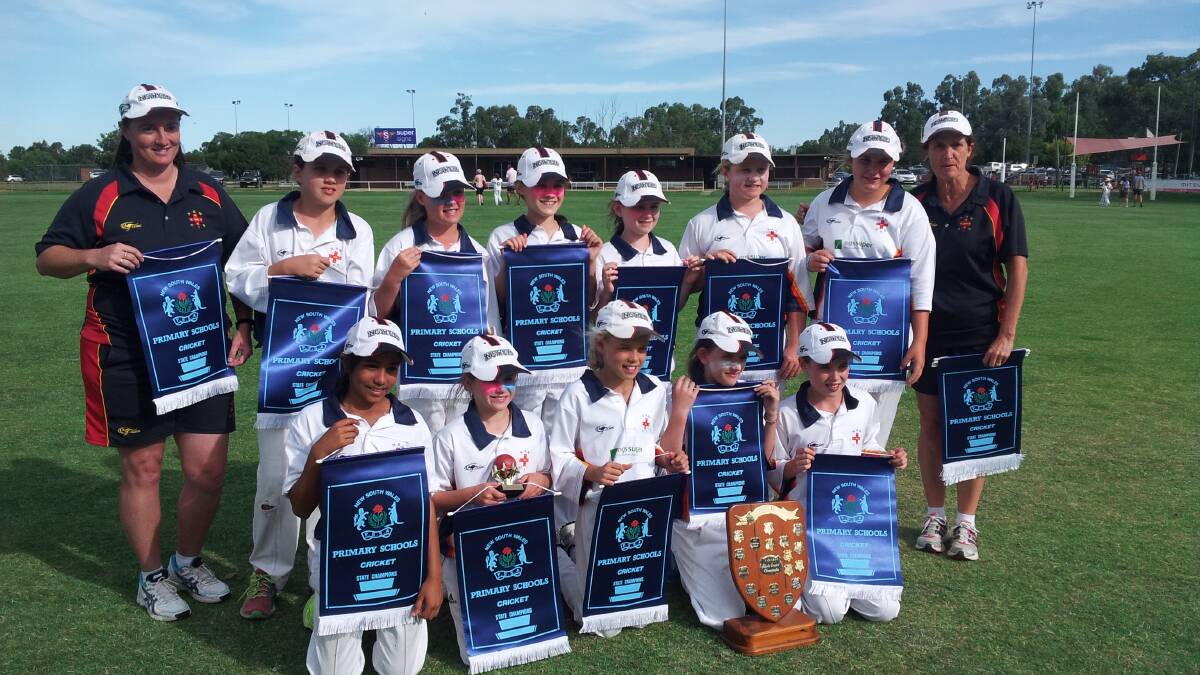Calrossy’s Jess Davidson (back second from left) and her CIS team-mates with their winners’ pennants and the Platypus Shield.