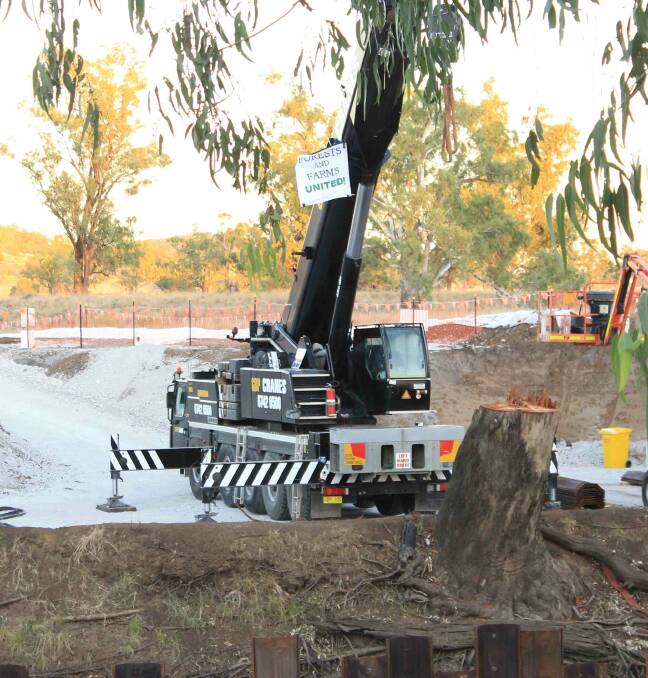 ARRESTS MADE: This crane at work on a rail spur was targeted by Leard Alliance protesters yesterday.
