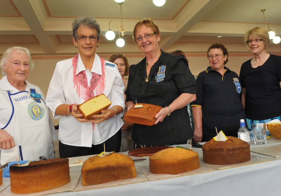 BAKE-OFF: Pictured at the Wanthella group’s cake judging on Friday were, from left, steward Elva Clow, judges Morna Wilson and Barbara Reichert, and stewards Eunice Turner and Denise Hawdon. Photo: Geoff O’Neill 210314GOE01