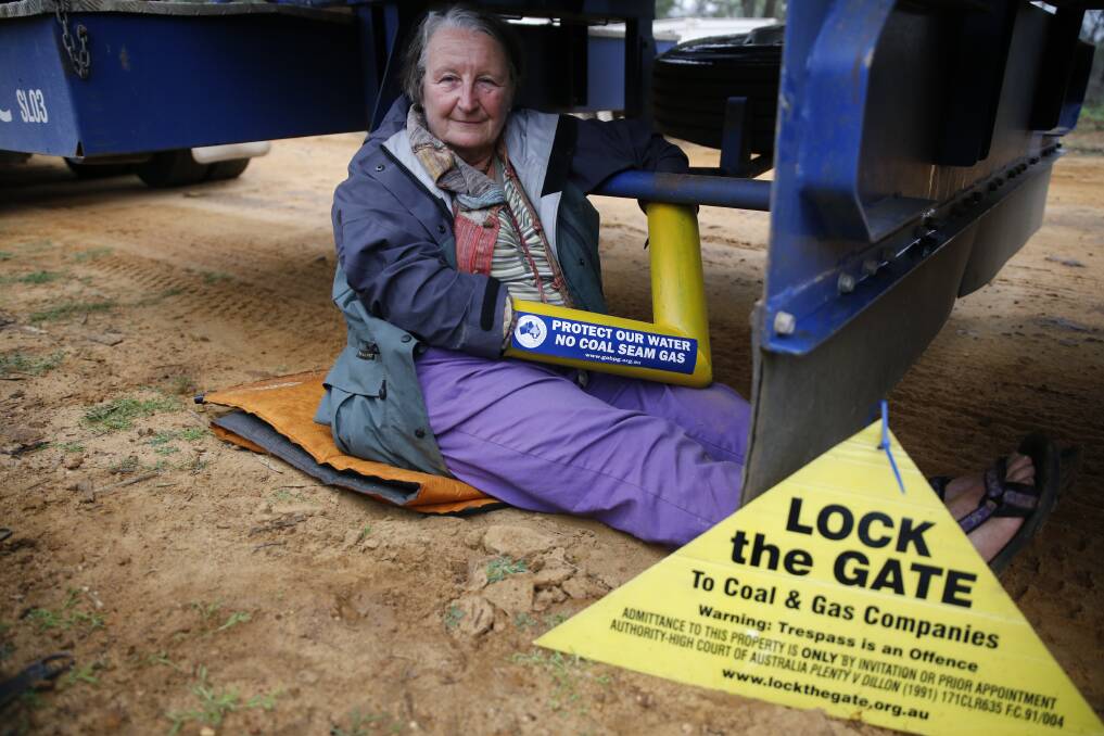 FIGHT GOES ON: Armidale grandmother Pat Schultz makes her views on the coal seam gas industry clear during a protest in the Pilliga Scrub near Narrabri in April.