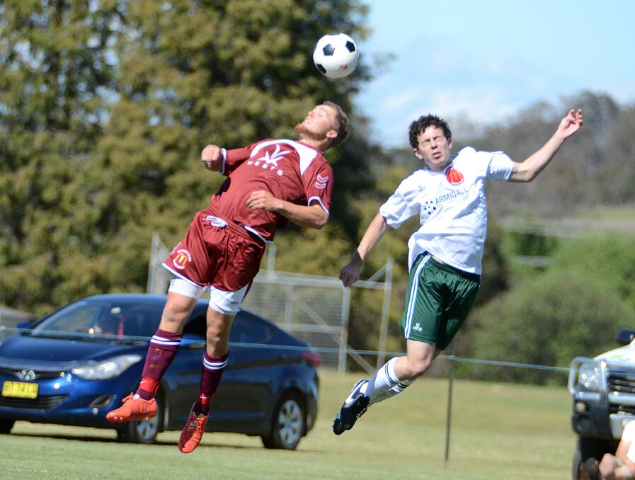 Luke Purcell (left) and Corey Rynne (right) battle for this high ball during the NIF All Stars. They might be playing for FFA Cup success next year too.
